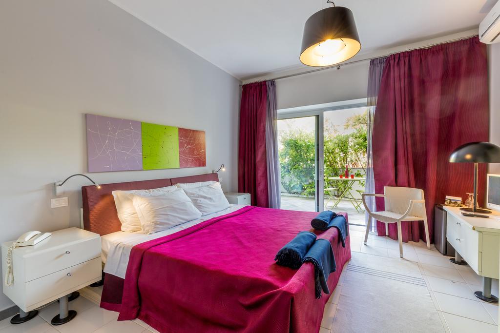 Hotel Residence Hibiscus La Caletta Buitenkant foto
