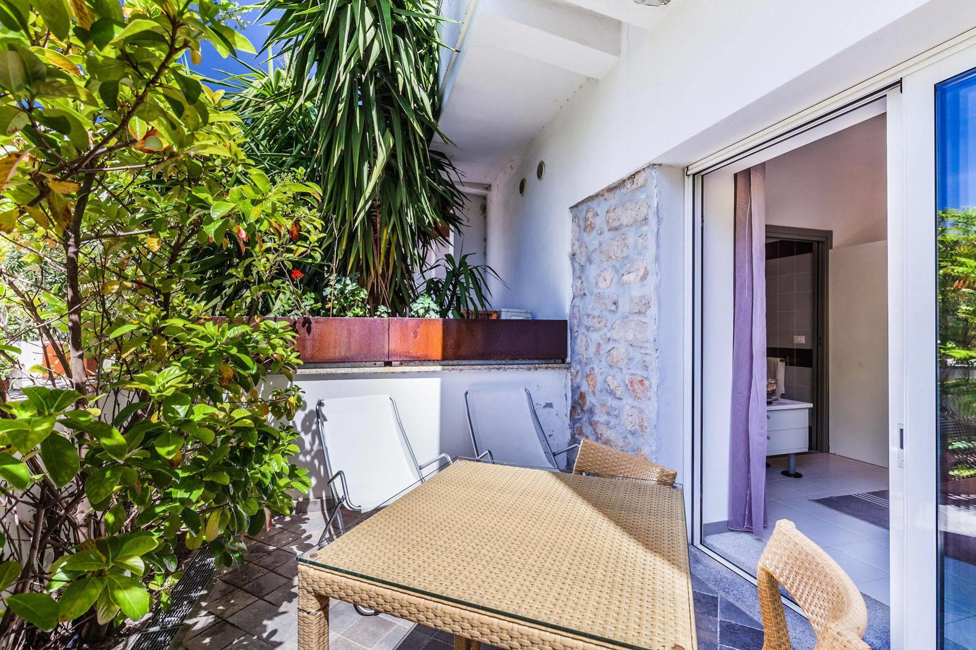 Hotel Residence Hibiscus La Caletta Buitenkant foto