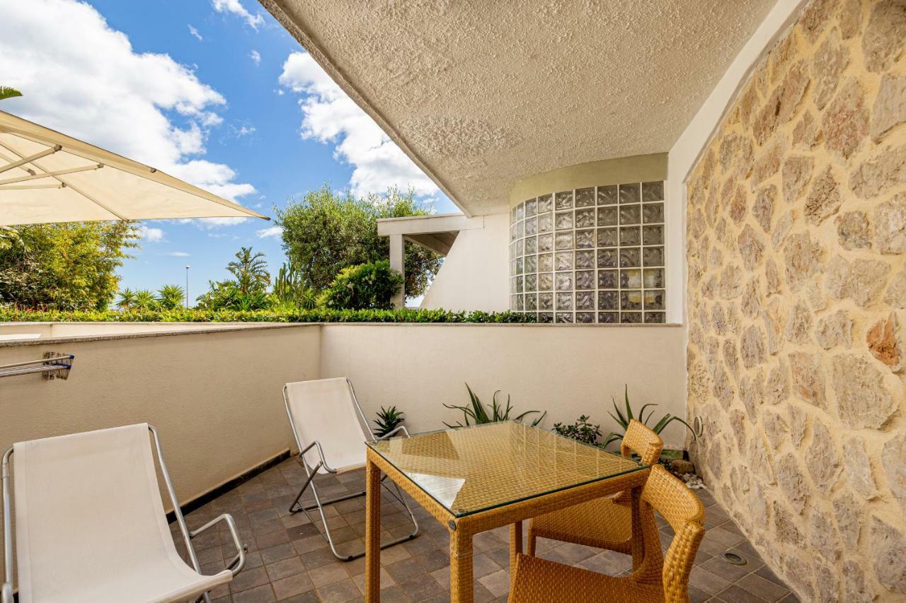 Hotel Residence Hibiscus La Caletta Buitenkant foto
